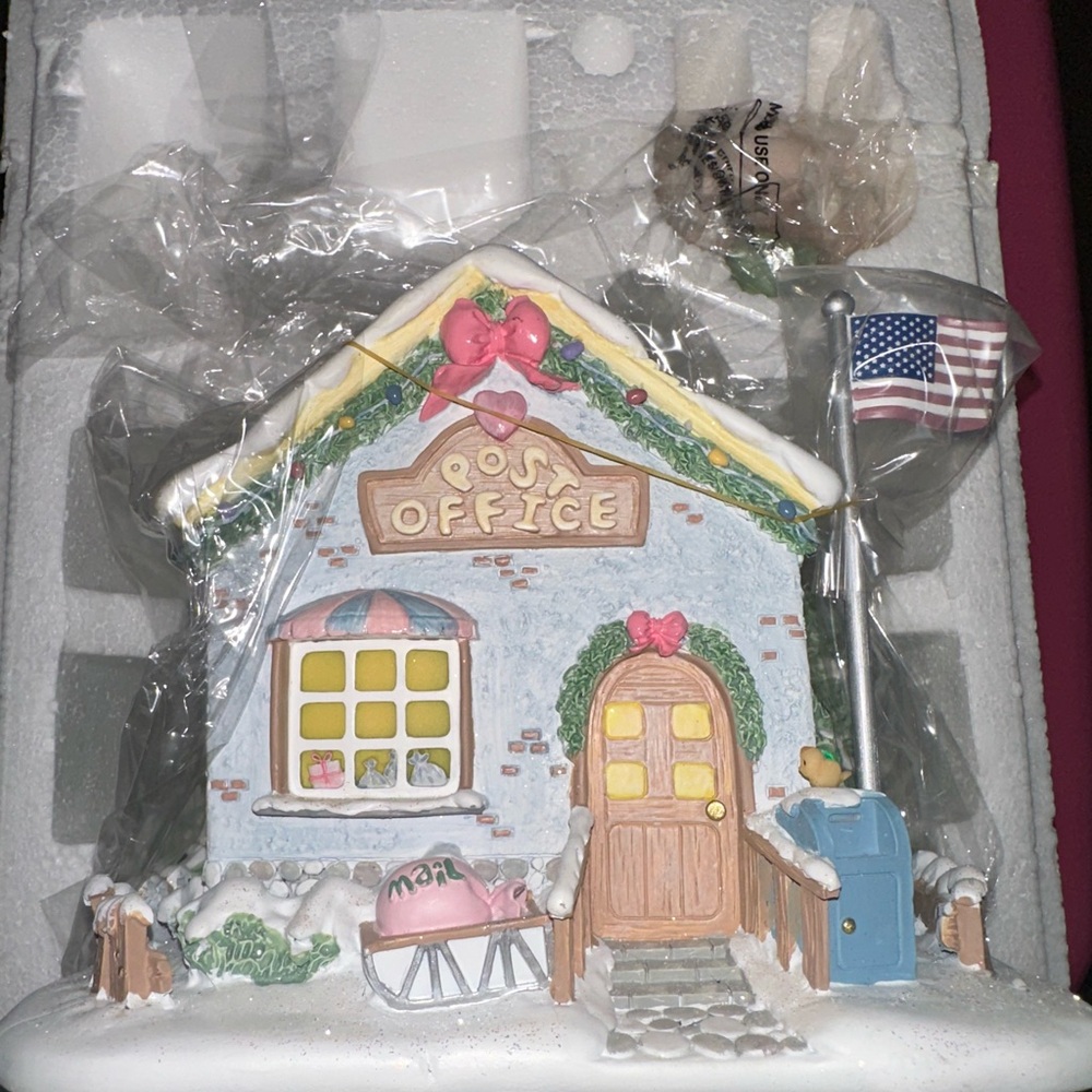 Precious Moments Holiday Post Office Decor with Red and Blue Accents